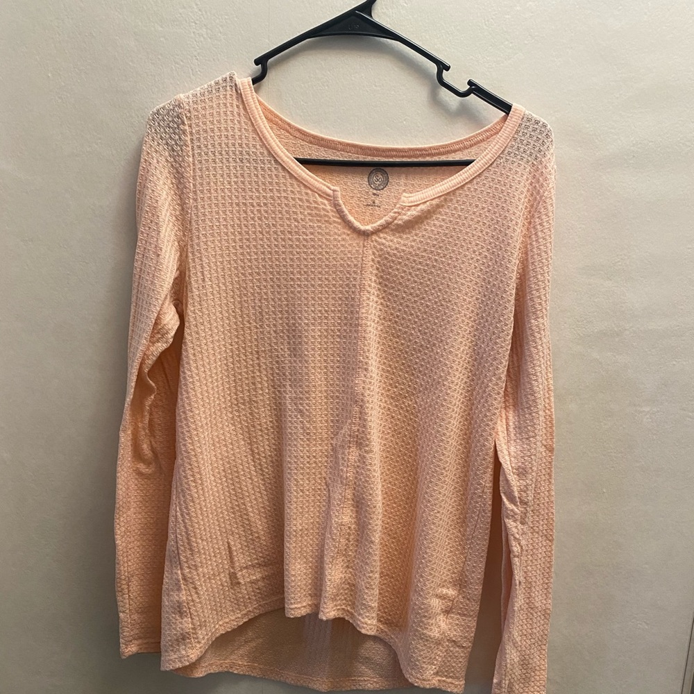 SO peach colored sweater, soft